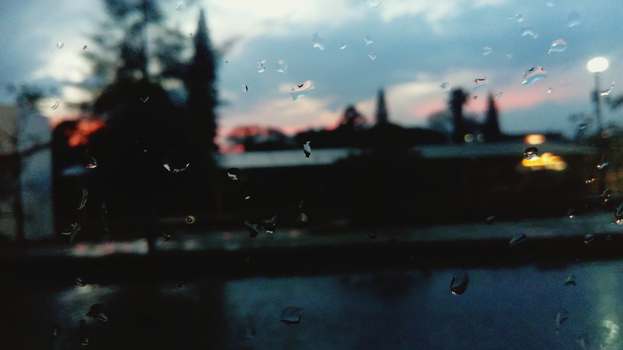 drop, glass - material, transparent, window, water, raindrop, rain, wet, close-up, car, focus on foreground, land vehicle, car interior, selective focus, mode of transport, sky, indoors, transportation, no people, day, nature, airplane wing