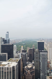 High angle view of buildings in city against sky