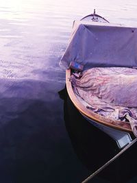 Boat moored in lake