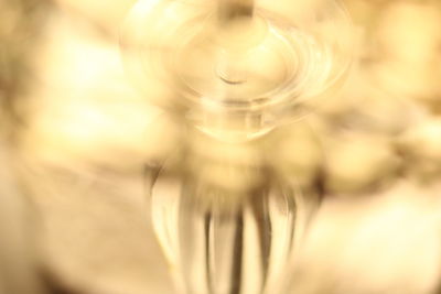 Close-up of glass bottle on table