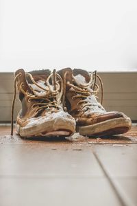 Close-up of shoes on table