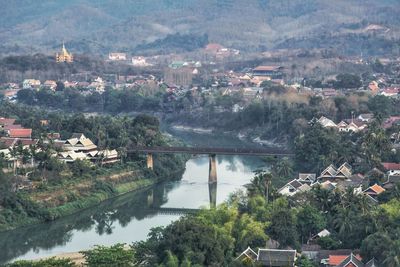 High angle view of townscape and mountains