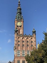 Buildings in city against sky