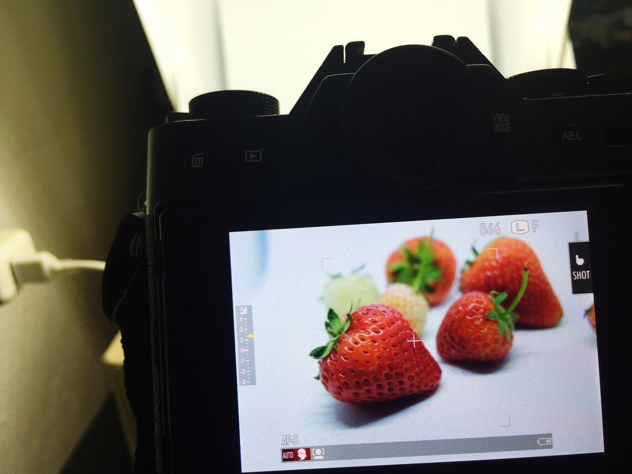 CLOSE-UP OF STRAWBERRIES ON TABLE IN RESTAURANT