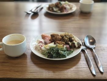 High angle view of breakfast served on table