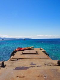 Scenic view of sea against blue sky