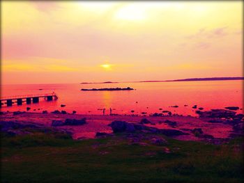 Scenic view of sea at sunset