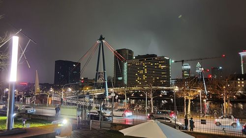 Illuminated buildings in city at night