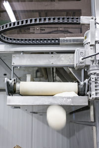 High angle view of flour in equipment at factory