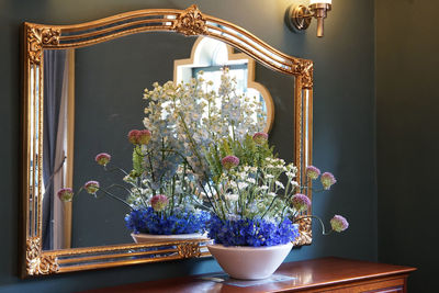 Flowers on the mirror stand