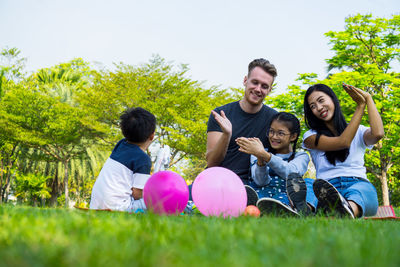 Happy family enjoying at park