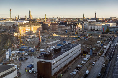 Morning view of a city skyline from an elevated vantage point. construction activities.