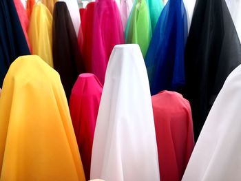 Multi colored umbrellas hanging in store