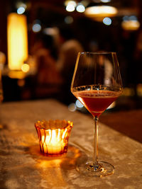 Close-up of wineglass on table