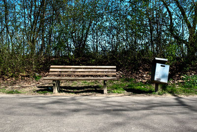 Empty bench in park