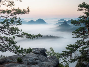 Scenic view of mountains against sky during sunset