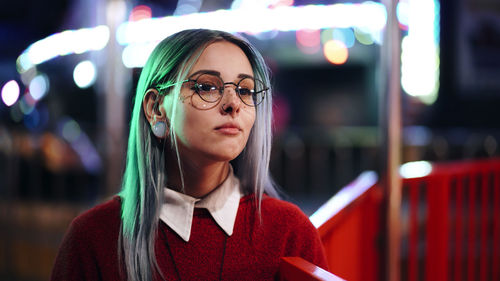 Portrait of young woman in cafe