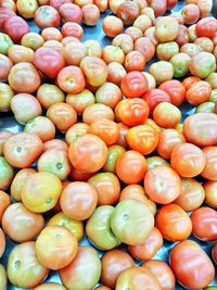 High angle view of oranges for sale at market stall