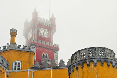 Low angle view of buildings against sky