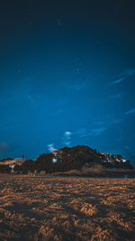 Scenic view of star field against sky at night