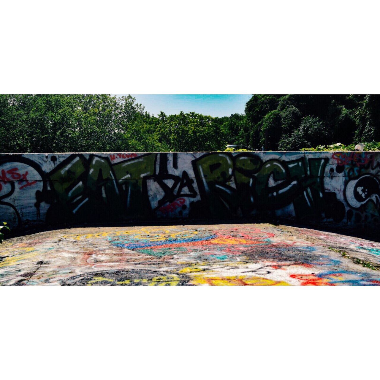 multi colored, graffiti, sea, creativity, outdoors, messy, sky, no people, colorful, standing water