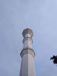 Low angle view of water tower against sky