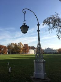 View of street light and trees in park