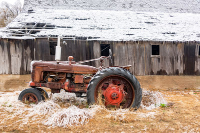 Abandoned tractor on field