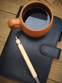 High angle view of cigarette on table