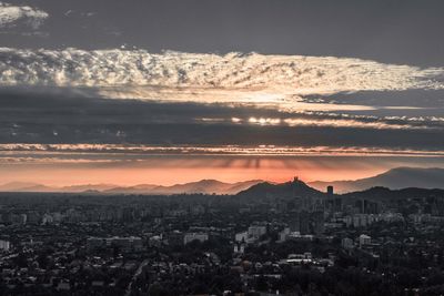 High angle view of townscape against sky during sunset