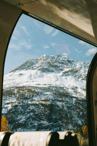 Mountains seen through window