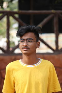 Portrait of young man wearing eyeglasses