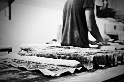 Close-up of man working on table