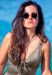 Portrait of beautiful woman wearing sunglasses