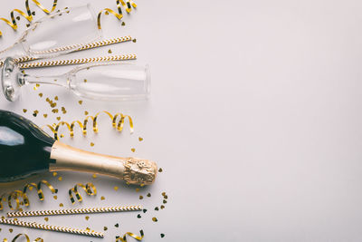 High angle view of beauty products against white background