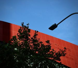 Low angle view of street light against sky