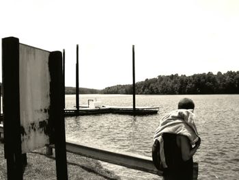 Rear view of man in lake