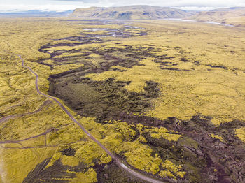 High angle view of road amidst land