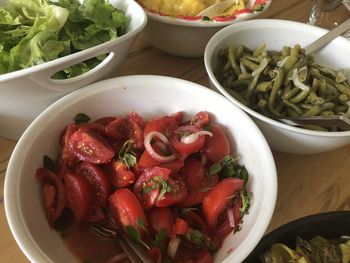 High angle view of chopped vegetables in bowl on table