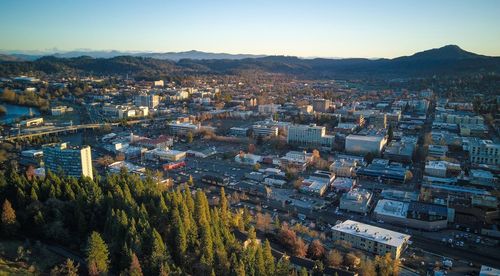 Aerial view of cityscape against clear sky