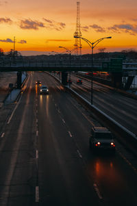 Illuminated road at sunset