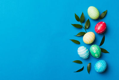 Directly above shot of fruits against blue background