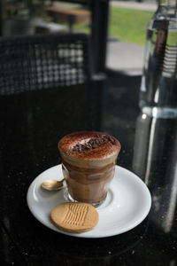 Close-up of coffee cup on table