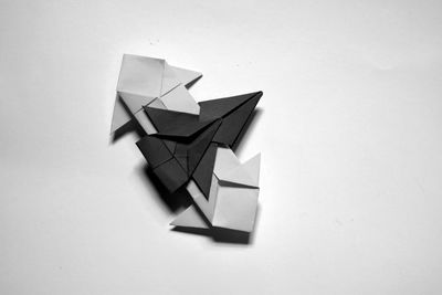 High angle view of paper toy against white background