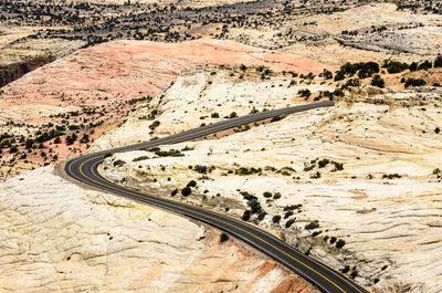 High angle view of road passing through land