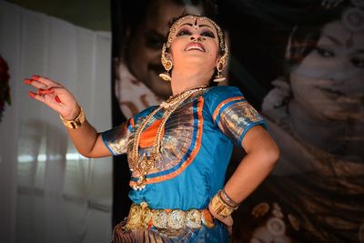 Young woman performing traditional dance