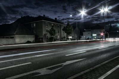 Light trails on city street at night