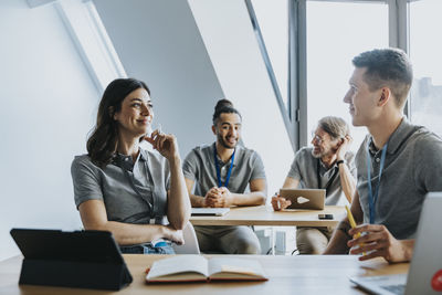 Group of people working on table