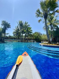 Scenic view of swimming pool against blue sky