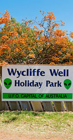 Information sign on field during autumn